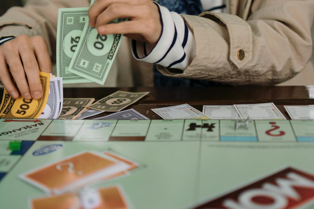 Monopoly—and other smart alternatives—can become powerful tools to teach children how to save, invest, and spend wisely.