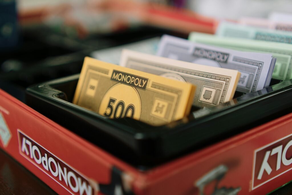 Monopoly—and other smart alternatives—can become powerful tools to teach children how to save, invest, and spend wisely.
